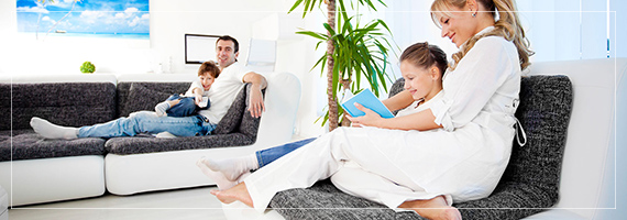 J&D Furniture | Sofas and Beds | Family enjoying in their living room.